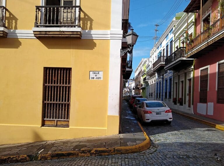 A colorful colonial street corner with balconies in Old San Juan, Puerto Rico